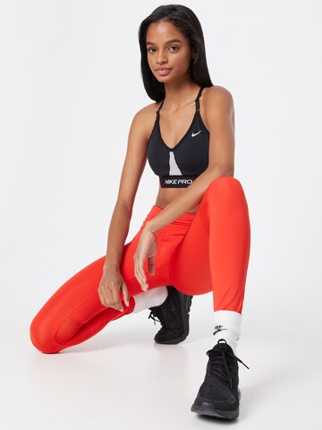 NIKE Skinny Sportovní kalhoty – červená