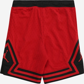 Regular Pantaloni 'AIR DIAMOND' de la Jordan pe roșu