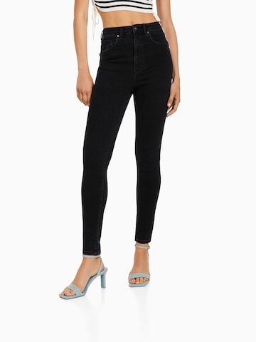 Bershka Skinny Jeans in Black: front