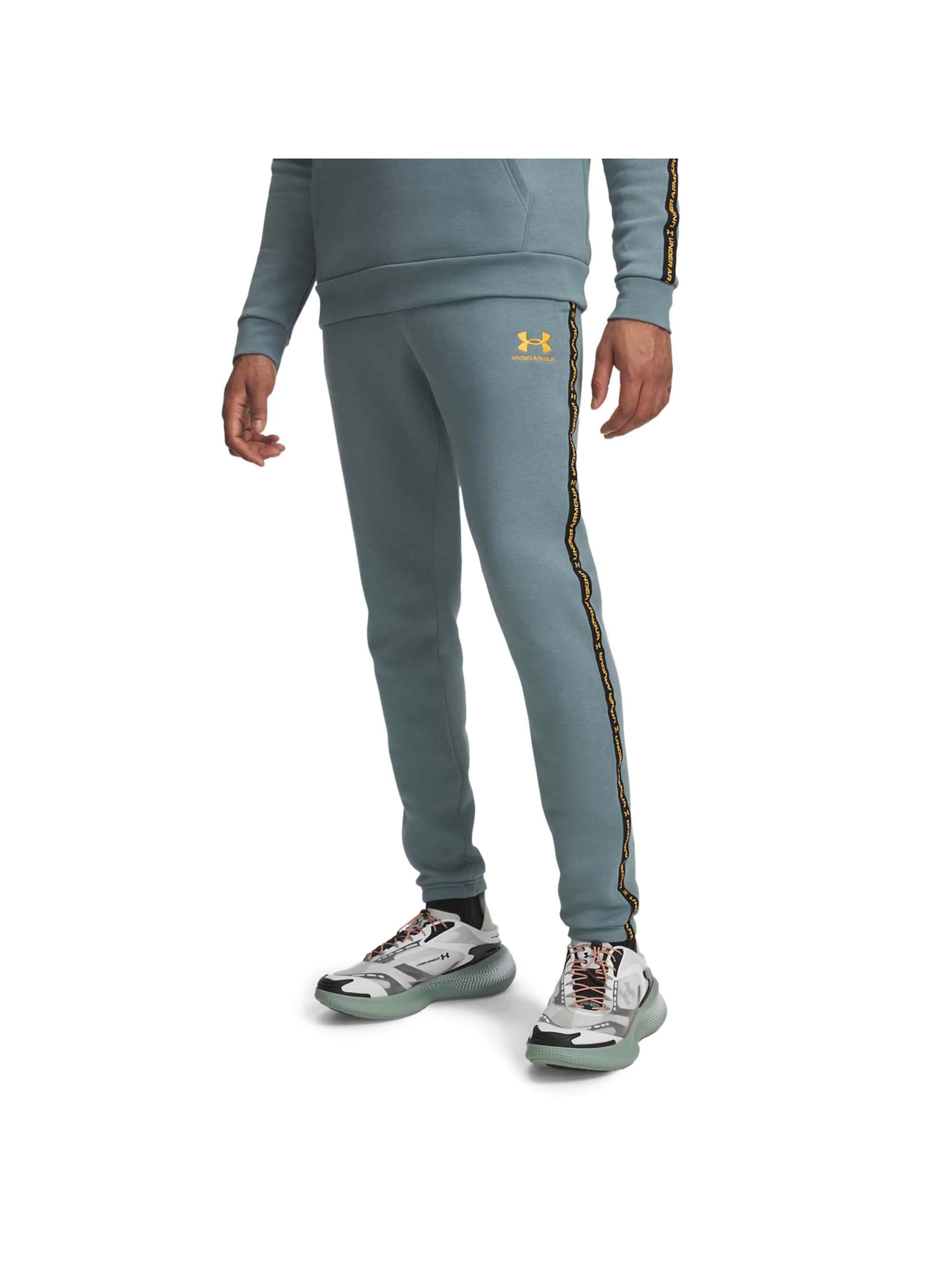 UNDER ARMOUR Slim fit Pants in Blue: front