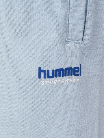 Effilé Pantalon de sport Hummel en bleu