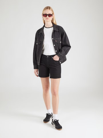 QS Slimfit Farkut 'Abby' värissä musta