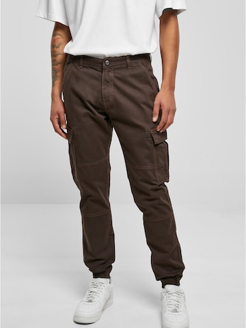 Tapered Pantaloni cargo di Urban Classics in marrone: frontale