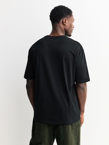 Next Paita 'Oasis' värissä musta