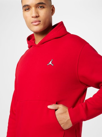 Bluză de molton 'ESS' de la Jordan pe roșu