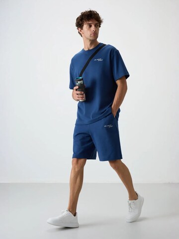 Tommy Life Sports suit in Blue: front