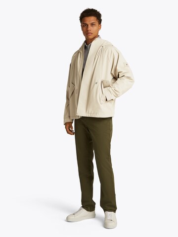 TOMMY HILFIGER Jacke 'TECH HOODED JKT' in Beige