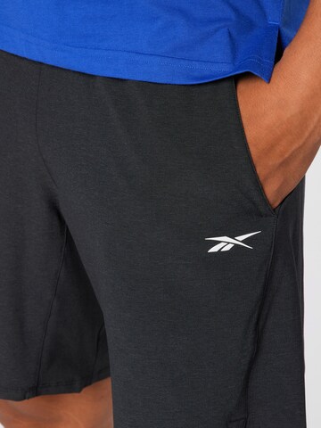 Regular Pantalon de sport 'Epic' Reebok en noir