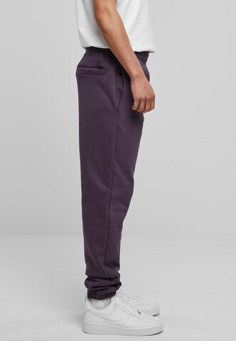 Tapered Pantaloni di Urban Classics in lilla