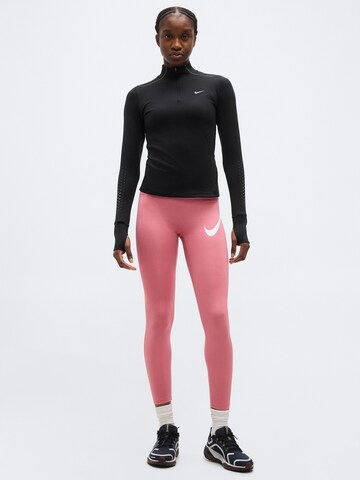 NIKESkinny Sportske hlače 'TEMPO' - roza boja