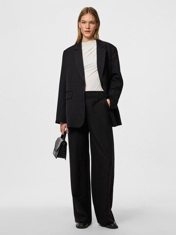 Wide leg Pantaloni 'Kamil' di PIECES in nero