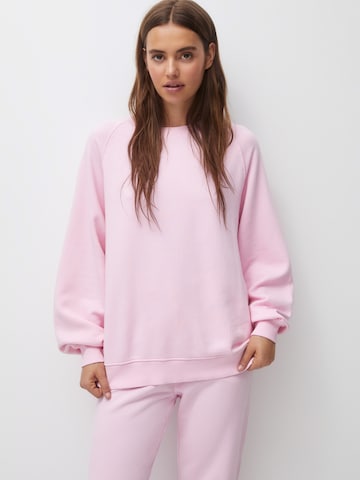 Bluză de molton de la Pull&Bear pe roz: față