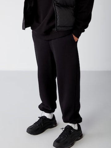 Grimelange Конический (Tapered) Штаны в Черный: спереди