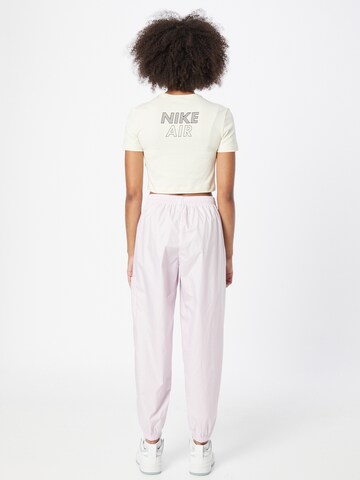 Effilé Pantalon Nike Sportswear en rose