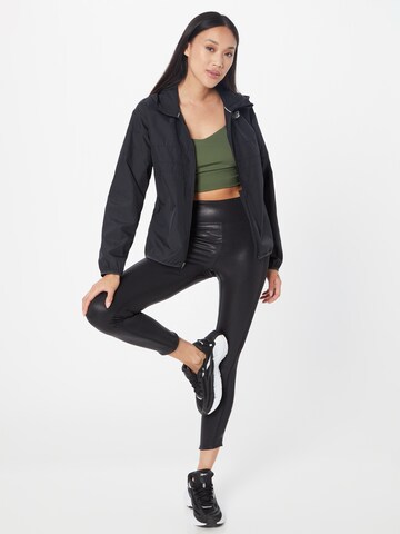 new balance - Chaqueta deportiva en negro