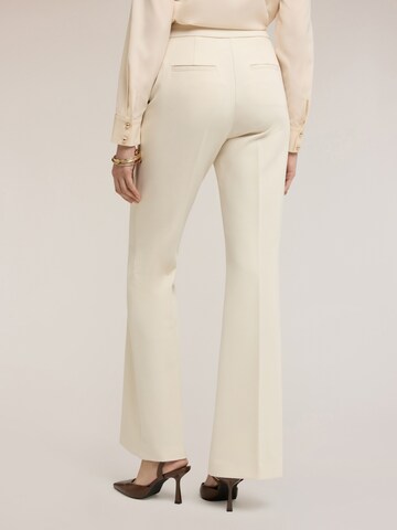 MOTIVI Flared Trousers in White
