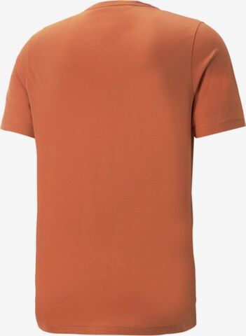 PUMA Performance Shirt 'Essentials' in Orange