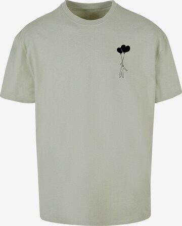 Merchcode T-Shirt 'Love In The Air' in Grün: predná strana