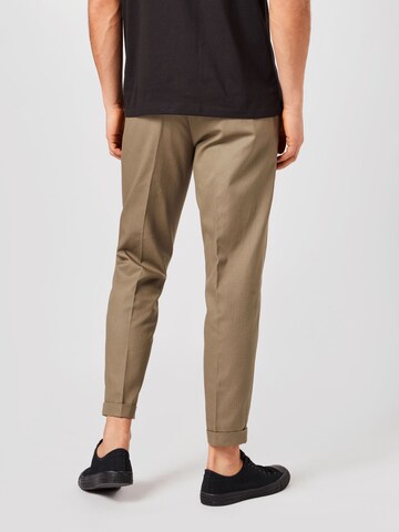 Effilé Pantalon à plis BURTON MENSWEAR LONDON en vert