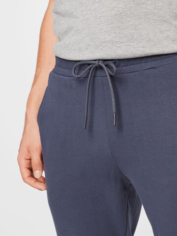 Hummel Tapered Sporthose in Blau