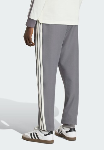ADIDAS PERFORMANCE - Tapered Calças de desporto em cinzento