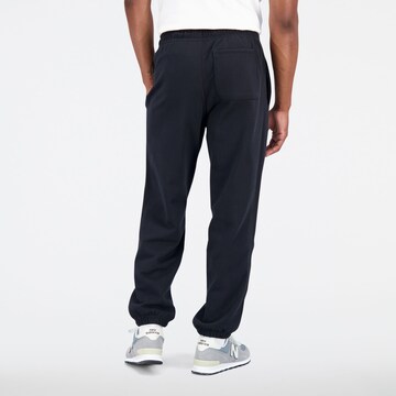 new balance Tapered Broek in Zwart