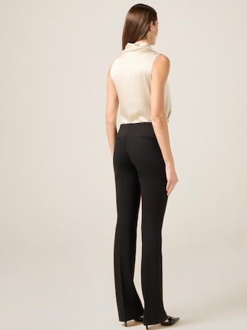 oltre Flared Trousers in Black