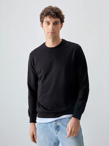 Tommy Life - Sweatshirt em preto: frente