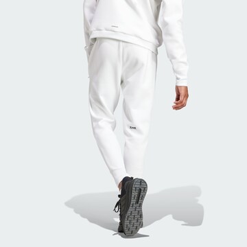 ADIDAS SPORTSWEAR Дънки Tapered Leg Спортен панталон 'Z.N.E. Premium' в бяло