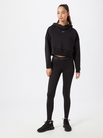 NIKE Skinny Športne hlače | črna barva