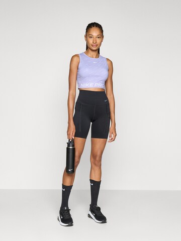 NIKE Спортивный топ в Лиловый