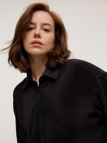 CITA MAASS - Blusa 'Penelope' en negro