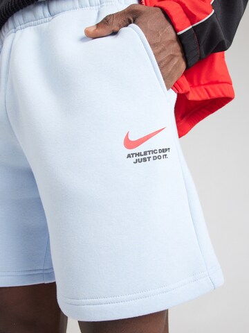 Loosefit Pantaloni di Nike Sportswear in blu