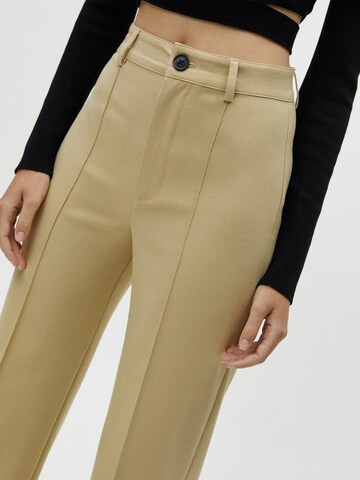 Pull&Bear Normalny krój Spodnie w kolorze beżowy