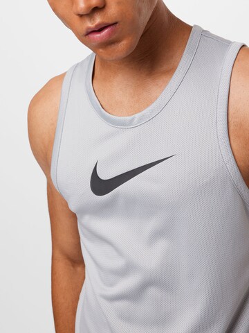 NIKE Sporttop in Grau