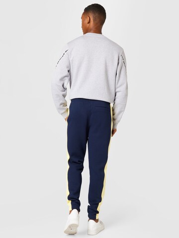 LACOSTE Конический (Tapered) Штаны в Синий