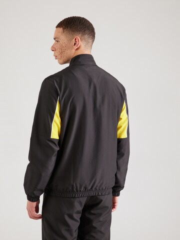PUMA Спортивная куртка 'Borussia Dortmund FtblArchive' в Черный