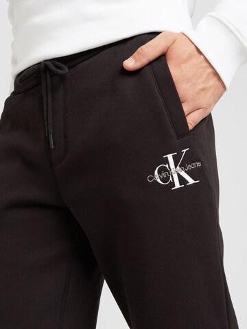 Tapered Pantaloni di Calvin Klein Jeans in nero