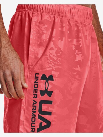 UNDER ARMOUR Regular Workout Pants 'Emboss' in Red