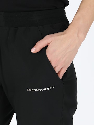 SWEDEMOUNT Regular Sporthose‌‌‌‌‌‌‌ in Schwarz