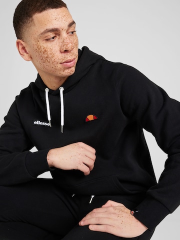 ELLESSE Jooksudress 'Traccota', värv must