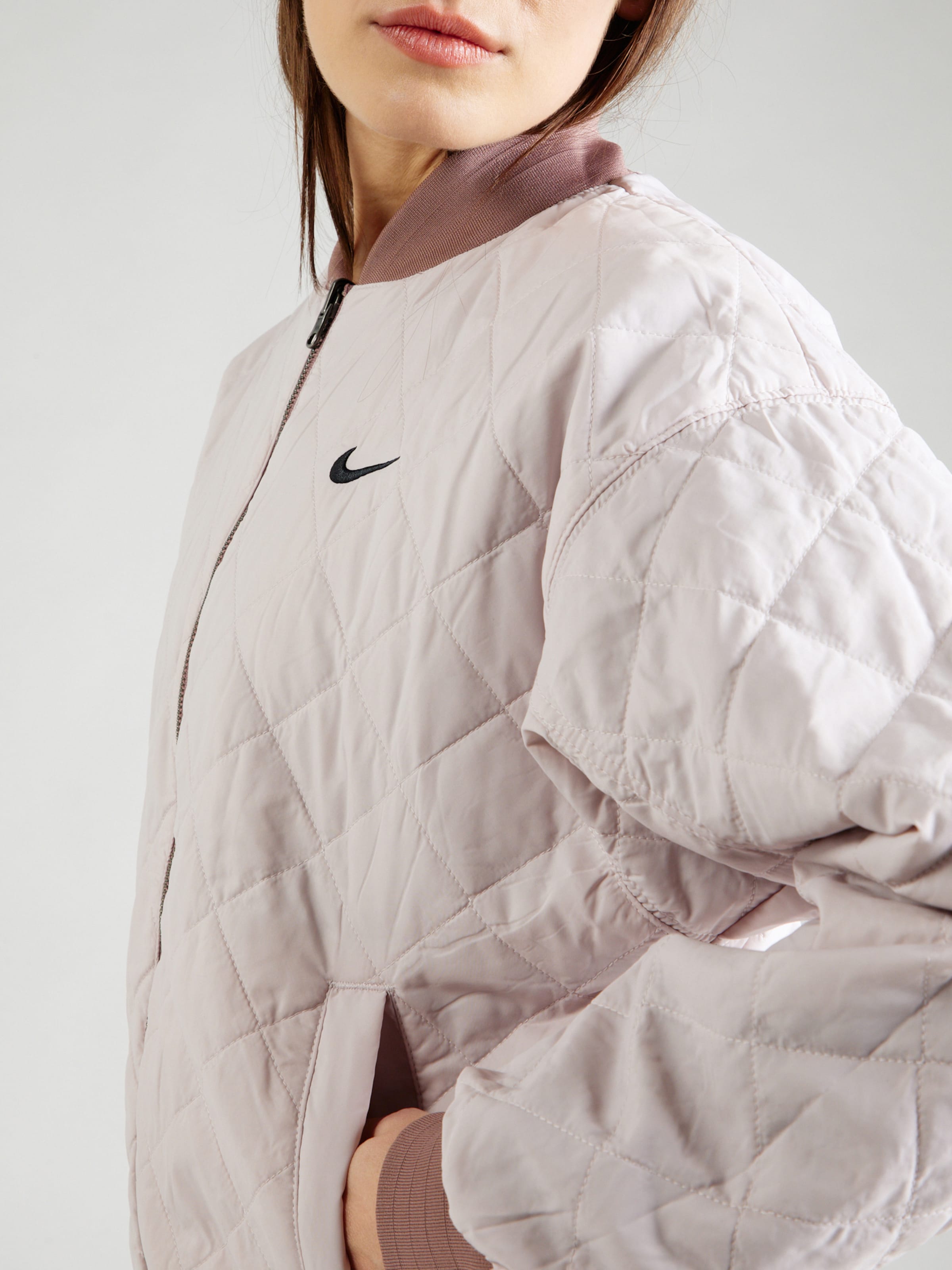 Nike Sportswear Between Season Jacket in Mauve Pastel Purple ABOUT YOU