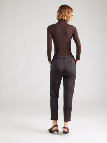 Tapered Pantaloni con piega frontale 'Feroce' di MM by Max Mara in nero
