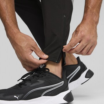 PUMA Tapered Sporthose 'Train All Day' in Schwarz