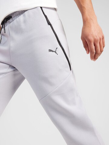 Effilé Pantalon de sport PUMA en gris