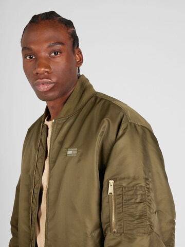 Tommy Jeans - Chaqueta de entretiempo 'Authentic' en verde