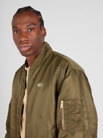 Veste mi-saison 'Authentic' Tommy Jeans en vert