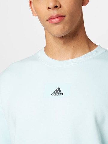 ADIDAS SPORTSWEAR Sportsweatshirt 'Essentials Feelvivid  Fleece Drop Shoulder' in Blau