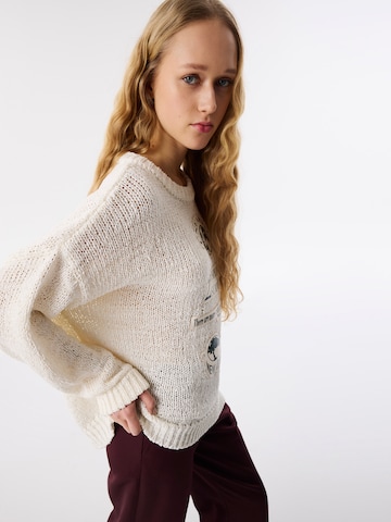 Pull-over Twist en beige