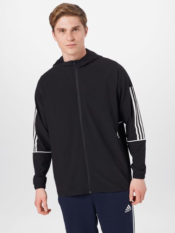 ADIDAS SPORTSWEAR - Chaqueta de chándal en negro: frente